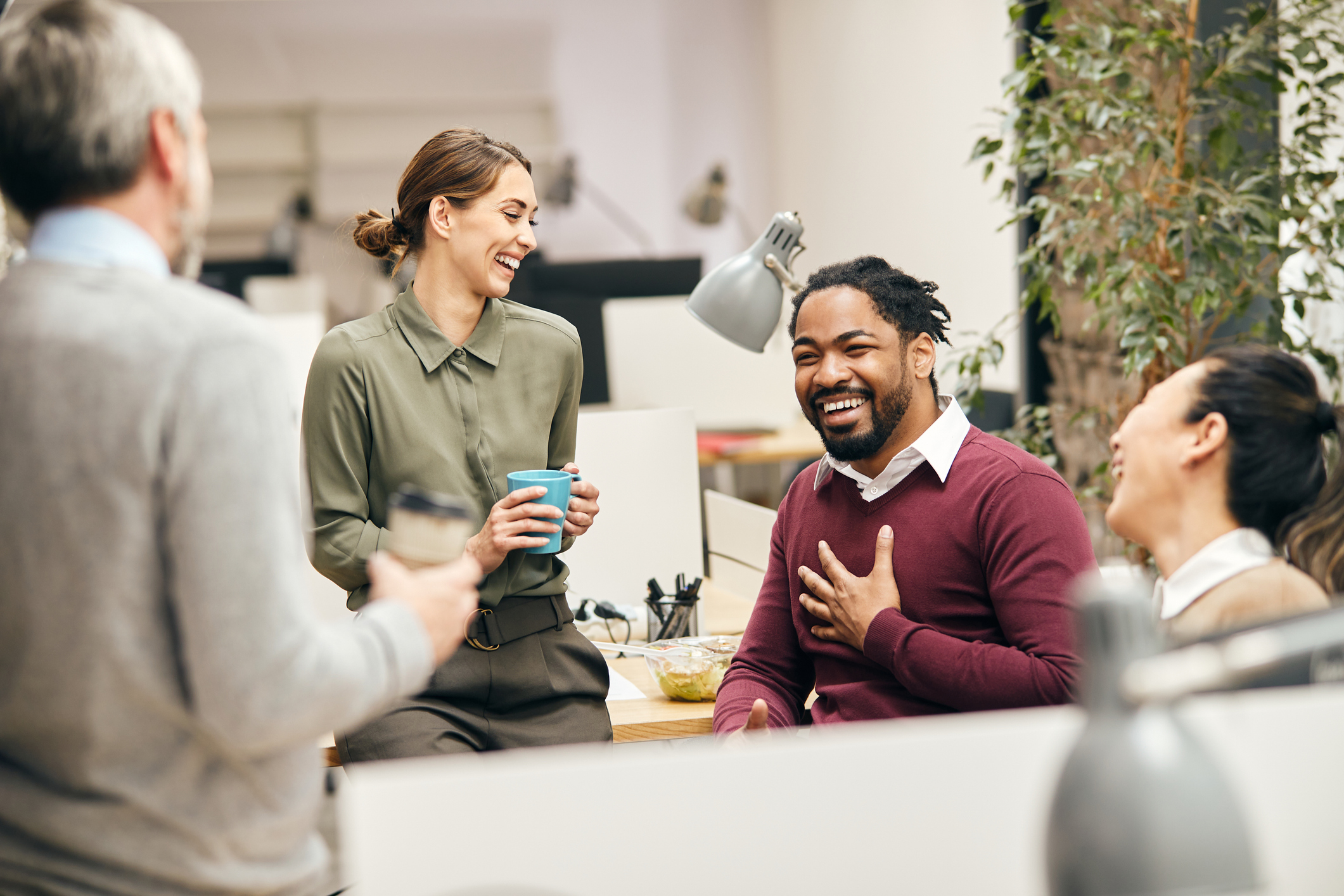 coworkers smiling and laughing